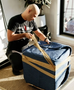 Prossional mover packing furniture for the move, Flash Moving