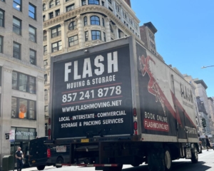 Moving box truck parked near apartment building, Flash Moving and Storage